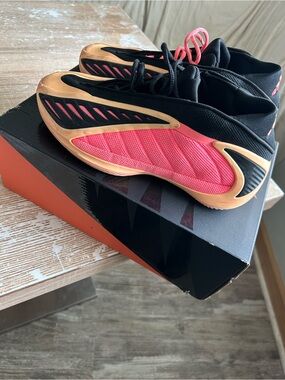 adidas Black and Pink Basketball Shoes with Orange AccentsAnthony Edward’s bask